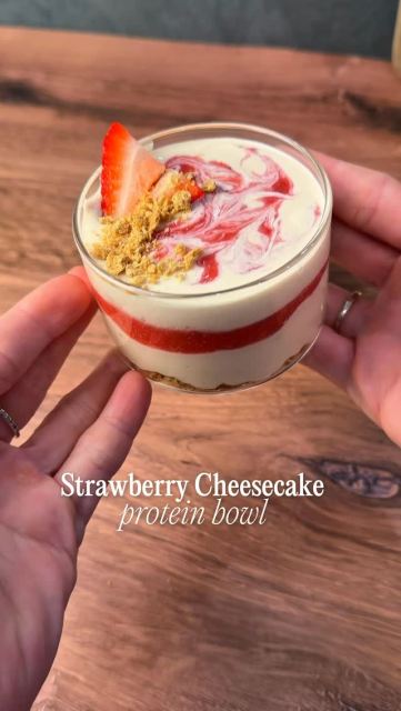 Strawberry Cheesecake Protein Bowls 🍓🤍

Over 30g of protein per serving and tastes like strawberry cheesecake.

Creamy cheesecake filling, a fresh strawberry swirl and graham cracker layers make this the perfect high protein breakfast, snack or dessert. Takes only a few minutes to prep!

✨ Makes 2 servings
Crust
• 3-4 tbsp graham cracker crumbs

Cheesecake Filling
• 1 cup cottage cheese
• 1 tbsp cashew butter
• 1 tbsp maple syrup
• 1 tsp vanilla extract
• Pinch sea salt
• 1 serving Vanilla Protein Powder (I use @nakednutrition Vanilla Naked Whey Iso)

Strawberry Layer
• 1/2 cup strawberries, blended until smooth

Instructions
	1. Split the graham cracker crumbs into the bottom of 2 bowls.
	2. Blend the cottage cheese, cashew butter, maple syrup, vanilla and sea salt until smooth and creamy. Blend in the protein powder.
	3. Blend the strawberries separately until smooth.
	4. Layer half of the cheesecake mixture over the graham cracker crumbs.
	5. Add a layer of blended strawberries.
	6. Top with the remaining cheesecake mixture and swirl a little of the strawberry puree into the top layer.
	7. Garnish with sliced strawberries and a sprinkle of crushed graham cracker.
	8.Chill for at least 30 minutes to thicken.

Save this one for your next sweet craving. 🍓🤍

#strawberrycheesecake #proteindessert  #easyrecipe #healthyrecipe #proteinpacked